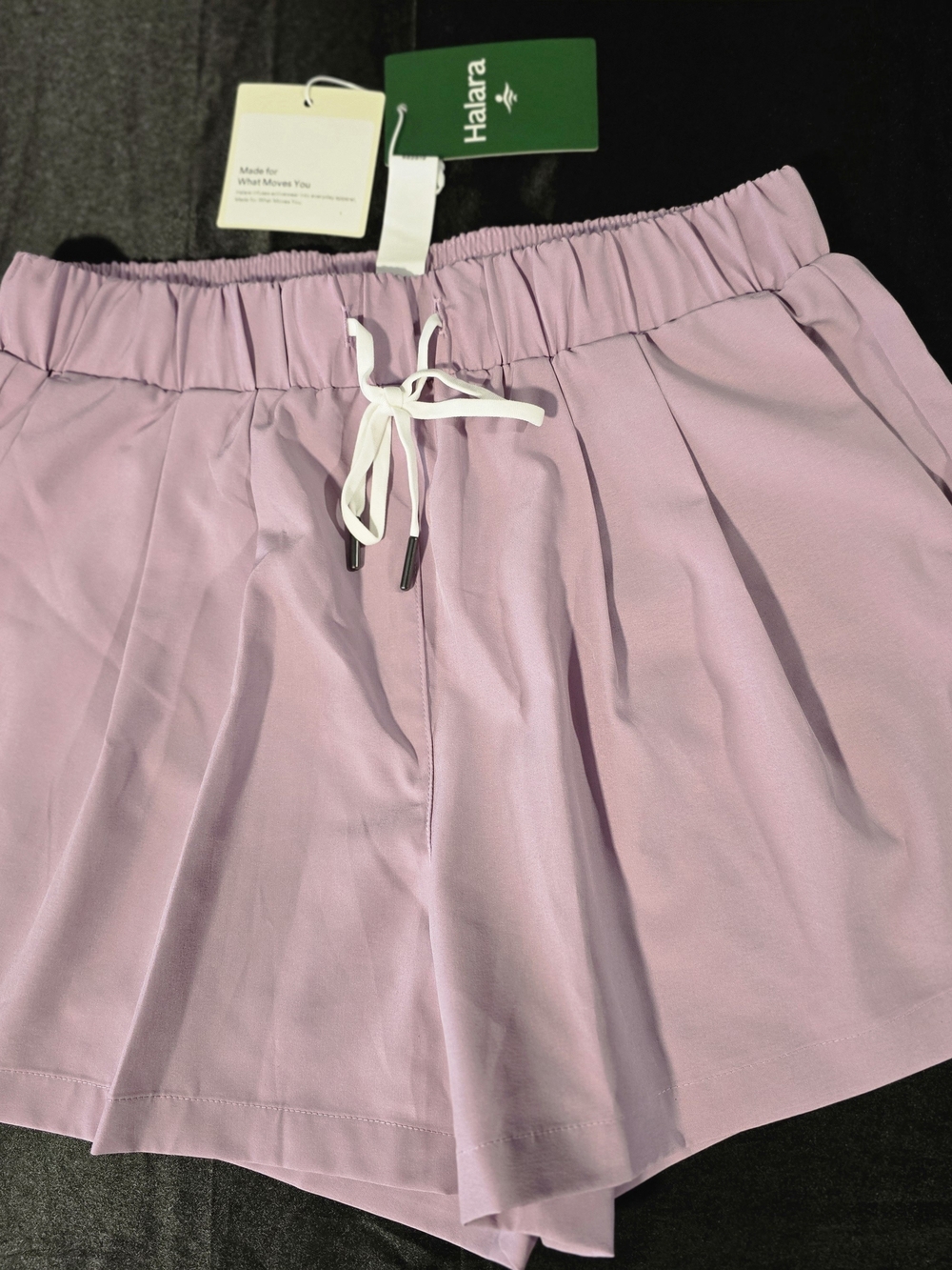 Halara Women's High Waisted Drawstring Side Pocket Running Shorts In Lavender.